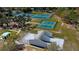 Aerial view of community tennis, pickleball, and racquetball courts at 4425 Merrick Run Ln, Valrico, FL 33596