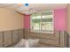 Bedroom undergoing renovation, featuring a window looking out to the carport at 4715 Bay Ne St # 126, St Petersburg, FL 33703