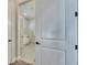 Bathroom view showcasing a bathtub through an open door at 5318 Wishing Arch Dr, Apollo Beach, FL 33572