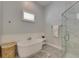 Bright bathroom with a standalone tub and glass shower at 5318 Wishing Arch Dr, Apollo Beach, FL 33572
