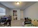 Spacious bedroom with two beds and dresser offering ample storage, plus a closet and interior door at 5704 Half Moon Lake Rd, Tampa, FL 33625