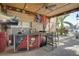 Outdoor covered bar area that is perfect for entertaining and is accented by Tampa Bay Buccaneers decor at 5704 Half Moon Lake Rd, Tampa, FL 33625