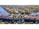 Aerial view of waterfront community with lush landscaping and boat docks at 6323 Newtown Cir # 23A1, Tampa, FL 33615