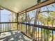 Screened-in lanai offering picturesque water views, perfect for relaxing outdoors at 6323 Newtown Cir # 23A1, Tampa, FL 33615