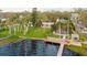 Lush backyard with dock and screened in back porch at 680 George S St, Tarpon Springs, FL 34688