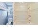 Bathroom with a tub/shower combo, toilet, and tile accents at 680 George S St, Tarpon Springs, FL 34688