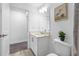 Bright bathroom featuring a vanity, artwork, and modern fixtures at 7125 6Th N Ave, St Petersburg, FL 33710