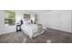 Cozy bedroom featuring an inviting bed and carpet floors at 7125 6Th N Ave, St Petersburg, FL 33710