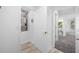 Utility closet with HVAC and tile flooring, plus access to the upstairs hallway at 7125 6Th N Ave, St Petersburg, FL 33710