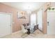 Dining area with modern glass table, chandelier lighting, and neutral walls at 10011 Tranquility Way, Tampa, FL 33625