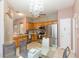 Bright kitchen featuring wooden cabinets, stainless steel appliances, tile flooring, and an open layout at 10011 Tranquility Way, Tampa, FL 33625