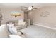 Open living area with neutral walls, wood floors, and comfortable seating at 10011 Tranquility Way, Tampa, FL 33625