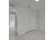 Bright bedroom featuring a large closet and marble floors throughout at 14207 Fort Worth Cir, Port Charlotte, FL 33981