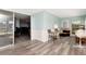 Spacious bonus room with sliding glass doors and ample natural light at 18675 Us Highway 19 N # 217, Clearwater, FL 33764