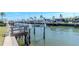 Scenic view of a waterfront with docks, offering boating access and neighborhood views at 18675 Us Highway 19 N # 217, Clearwater, FL 33764