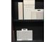 Selection of material samples including Winstead White kitchen cabinets and coordinated counter and flooring options at 19410 Indian Rock Pl, Lakewood Ranch, FL 34211