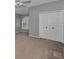 Bedroom includes a closet with double doors and window allowing natural light at 2075 Warwick Dr, Oldsmar, FL 34677