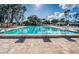 A large community pool offers a place for residents to gather and enjoy the Florida sunshine at 2075 Warwick Dr, Oldsmar, FL 34677