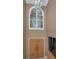 Interior view looking at the front doors and second story arched window at 2075 Warwick Dr, Oldsmar, FL 34677