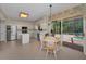 Inviting kitchen and breakfast nook offering a smooth flow to the pool and patio area at 2075 Warwick Dr, Oldsmar, FL 34677