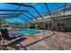 Back of house overlooking the pool and spa, perfect for entertaining at 2075 Warwick Dr, Oldsmar, FL 34677