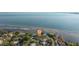 Expansive aerial view of the waterfront home on a tranquil bay at 2158 Blossom S Way, St Petersburg, FL 33712