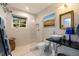 Modern bathroom featuring a glass shower, vessel sink, and serene natural light at 2158 Blossom S Way, St Petersburg, FL 33712