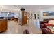 Spacious kitchen with modern stainless steel appliances and adjacent living area at 2158 Blossom S Way, St Petersburg, FL 33712