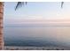 Calm waterfront view featuring a distant bridge, captured on a serene day at 2158 Blossom S Way, St Petersburg, FL 33712