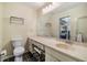Well-lit bathroom features a spacious vanity, large mirror, and a walk-in shower at 2263 Citrus Ct, Clearwater, FL 33763