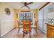 Bright dining area with a ceiling fan and a view of the yard through the window at 2263 Citrus Ct, Clearwater, FL 33763