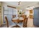 Cozy dining area with a round wooden table and seating, connecting to the kitchen at 2263 Citrus Ct, Clearwater, FL 33763