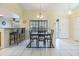 Open concept dining room with breakfast bar, tile floors and eat in dining area at 2263 Citrus Ct, Clearwater, FL 33763