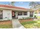 Charming single story home with a well manicured lawn and appealing front entrance at 2263 Citrus Ct, Clearwater, FL 33763