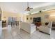 Open concept living space with tile floors, high ceilings and a ceiling fan at 2263 Citrus Ct, Clearwater, FL 33763