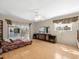 Bright primary bedroom featuring waterfront views and sliding doors to outdoor space at 2300 S Shore Se Dr, St Petersburg, FL 33705