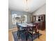 Charming dining area featuring traditional furnishings and natural light filtering through a large window at 2300 S Shore Se Dr, St Petersburg, FL 33705
