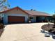 Charming single-story home with a clay tile roof and a two-car garage at 2300 S Shore Se Dr, St Petersburg, FL 33705