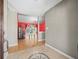 Open-concept foyer featuring wood flooring, views of the living area, and plenty of natural light at 2300 S Shore Se Dr, St Petersburg, FL 33705