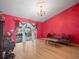 Bright living room featuring a comfortable sofa, elegant chandelier, and access to the lanai at 2300 S Shore Se Dr, St Petersburg, FL 33705