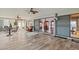 Wide view of bright sunroom, with tile floor and sliding glass doors for access at 2300 S Shore Se Dr, St Petersburg, FL 33705