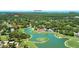 Aerial view of Timber Pines community featuring golf course, activity center, and lush landscaping at 2348 Rolling View Dr, Spring Hill, FL 34606