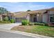 Charming home with well-maintained lawn, screen garage, brick accents and inviting entrance at 2348 Rolling View Dr, Spring Hill, FL 34606