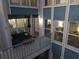 Cozy balcony with outdoor seating and views, perfect for relaxation and entertaining at 247 Rex Pl # G, Madeira Beach, FL 33708