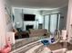 Open-concept area featuring a modern kitchen with an airy living area with stylish decor at 247 Rex Pl # G, Madeira Beach, FL 33708