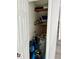 Storage closet with shelving and water heater at 247 Rex Pl # G, Madeira Beach, FL 33708