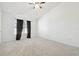 This spacious bedroom features a window for natural light and wall-to-wall carpeting at 2712 Conch Hollow Dr, Brandon, FL 33511