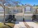 Inviting townhouse showcases a well-maintained front exterior and attached one-car garage with pleasant curb appeal at 2712 Conch Hollow Dr, Brandon, FL 33511
