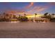 Stunning beachfront home featuring palm trees, panoramic ocean views, and direct access to the pristine sandy beach at 3351 Gulf Of Mexico Dr, Longboat Key, FL 34228