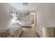 Bright bedroom with twin beds, and a shark decoration, and an ensuite bathroom at 3351 Gulf Of Mexico Dr, Longboat Key, FL 34228